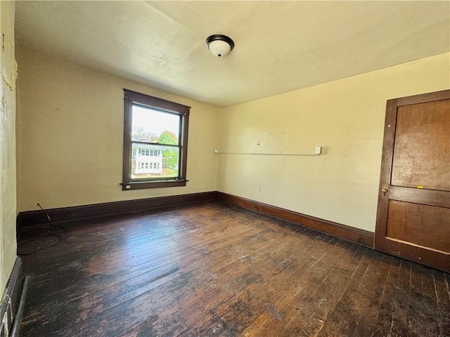432 Boyles Ave, New Castle/2Nd, PA 16101 - spare room with baseboards and dark wood finished floors