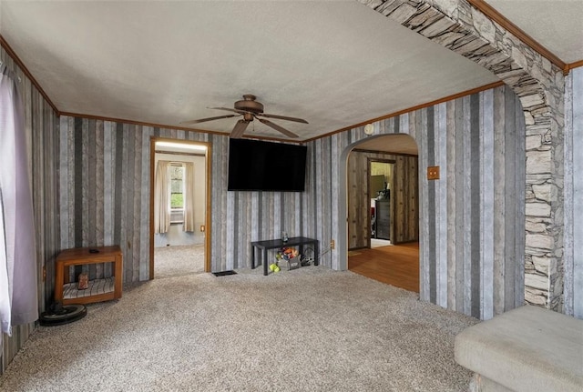 114 Angel Ave, Fairview Twp But, PA 16050 - carpeted living room with arched walkways, ceiling fan, ornamental molding, and wallpapered walls