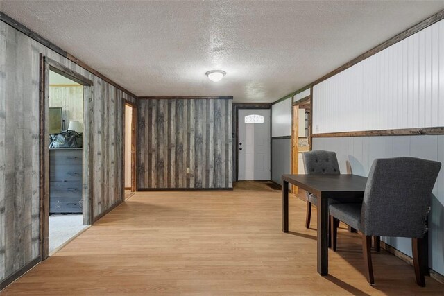 114 Angel Ave, Fairview Twp But, PA 16050 - dining area with light wood-style flooring and a textured ceiling