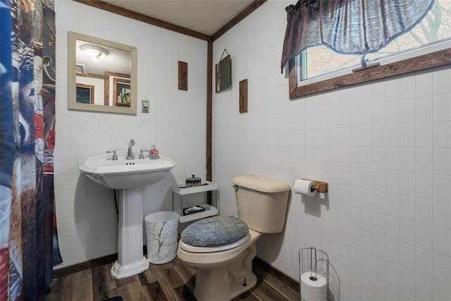 114 Angel Ave, Fairview Twp But, PA 16050 - bathroom with crown molding, tile walls, wood finished floors, toilet, and a sink