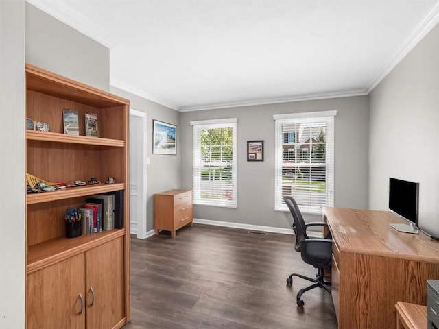 office area featuring crown molding, baseboards, dark wood finished floors, and visible vents