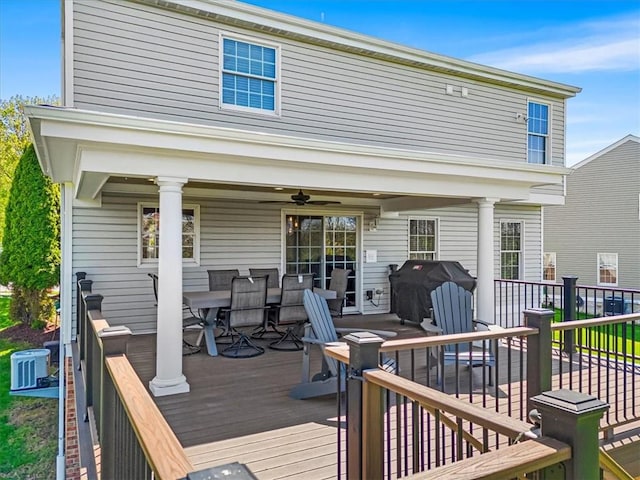 wooden deck featuring area for grilling, a ceiling fan, outdoor dining area, and central AC unit
