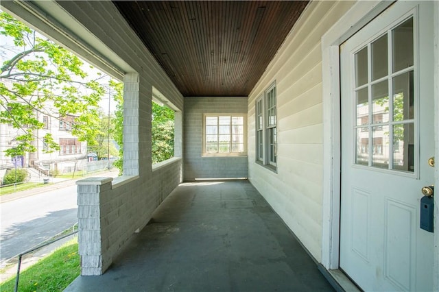 1211 Main St, Aliquippa, PA 15001 - view of patio featuring covered porch and a carport