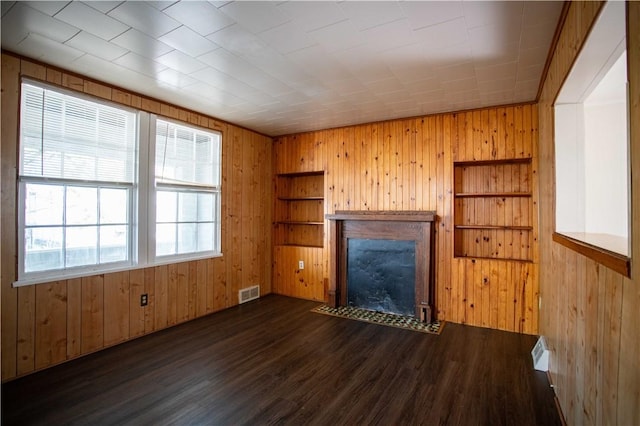 1211 Main St, Aliquippa, PA 15001 - unfurnished living room featuring wooden walls and visible vents