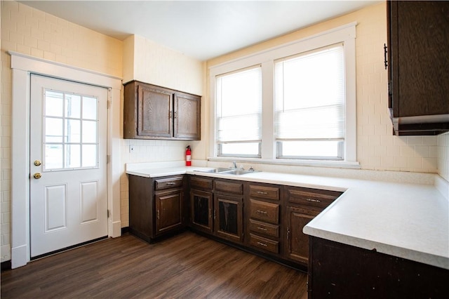 1211 Main St, Aliquippa, PA 15001 - kitchen with a sink, dark wood finished floors, dark brown cabinets, and light countertops