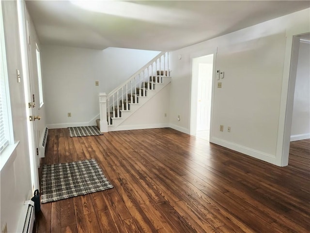 525 E Old Lincoln Hwy, Ligonier Twp, PA 15658 - foyer featuring baseboards, hardwood / wood-style floors, baseboard heating, and stairway