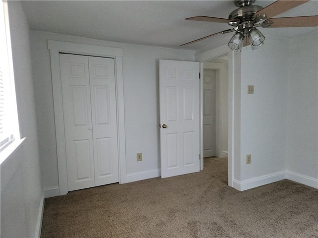 525 E Old Lincoln Hwy, Ligonier Twp, PA 15658 - unfurnished bedroom with carpet floors, baseboards, ceiling fan, and a closet