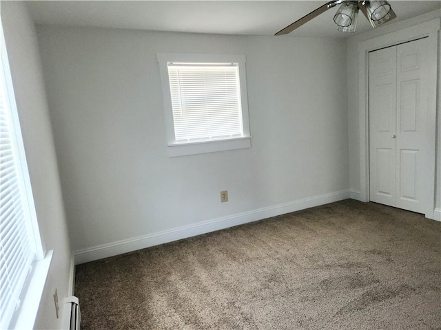 525 E Old Lincoln Hwy, Ligonier Twp, PA 15658 - unfurnished bedroom featuring a ceiling fan, baseboards, carpet, and a closet
