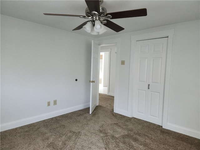 525 E Old Lincoln Hwy, Ligonier Twp, PA 15658 - unfurnished bedroom featuring carpet flooring, a ceiling fan, and baseboards