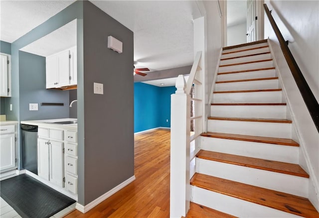 6326 Springhouse Pl, South Fayette, PA 15017 - stairs featuring baseboards, a ceiling fan, and wood finished floors