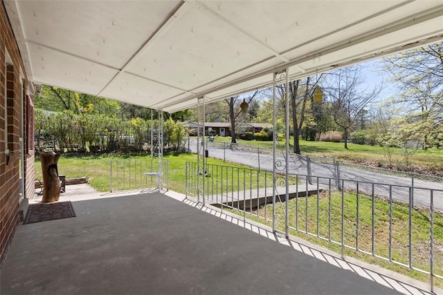 view of patio / terrace with a carport