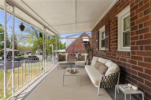 balcony with an outdoor hangout area