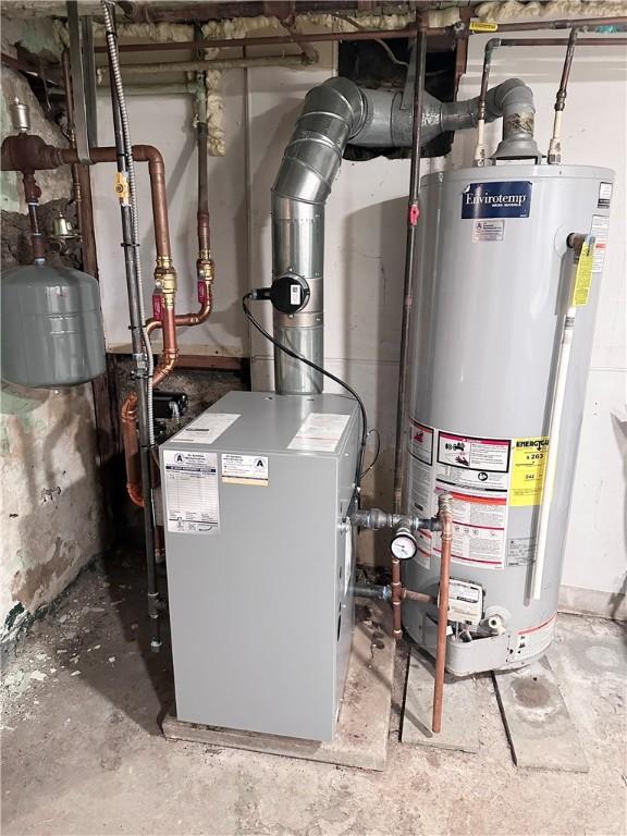 utilities with a heating unit and gas water heater