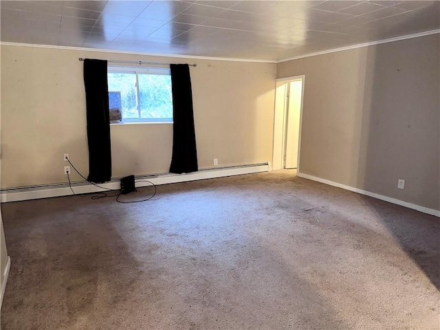 carpeted spare room featuring baseboards and ornamental molding