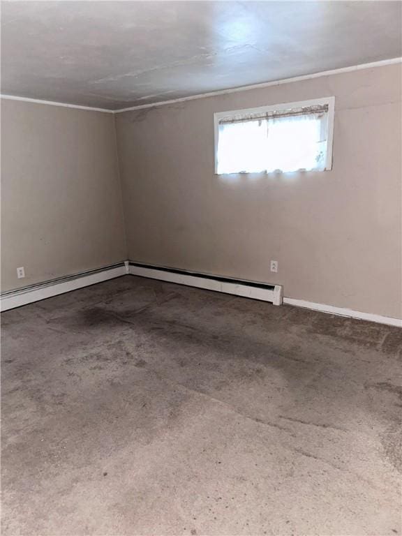 spare room with baseboards