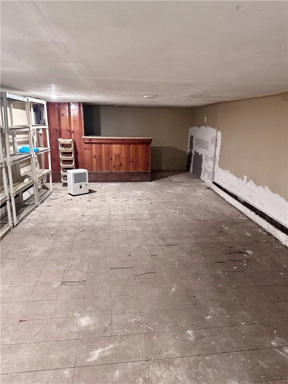 finished basement with a dry bar