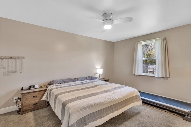 bedroom featuring carpet floors, baseboards, and a ceiling fan