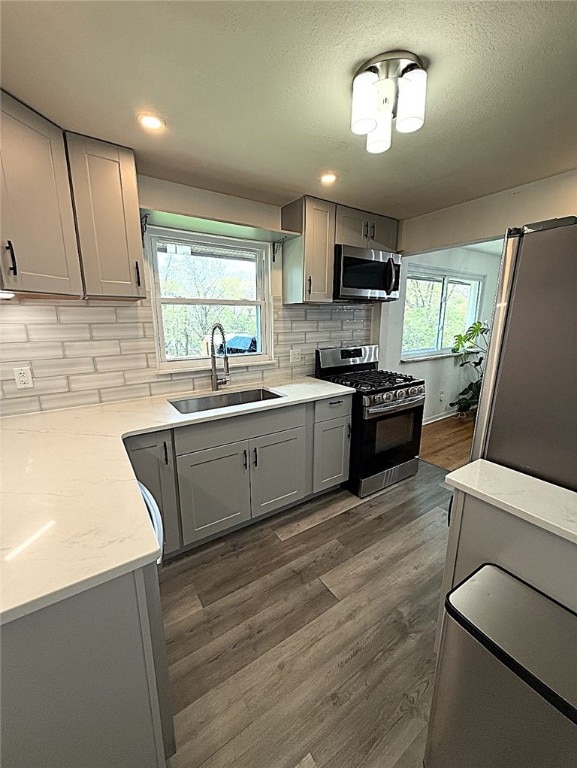 4402 Gateway Dr, Monroeville, PA 15146 - kitchen with a sink, appliances with stainless steel finishes, plenty of natural light, and gray cabinetry