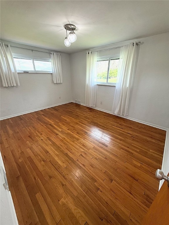 4402 Gateway Dr, Monroeville, PA 15146 - unfurnished room with visible vents, baseboards, and wood finished floors