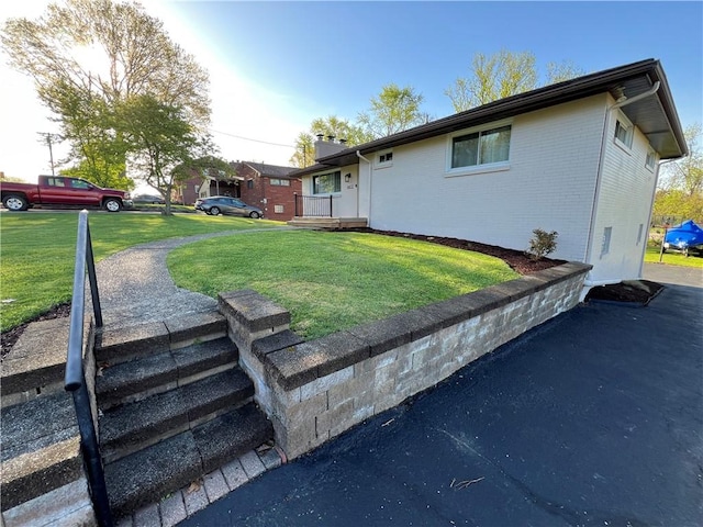 4402 Gateway Dr, Monroeville, PA 15146 - exterior space with brick siding, a chimney, and a front lawn