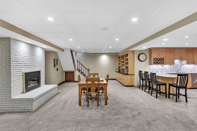 118 Lakeland Dr, Adams Twp, PA 16046 - dining space featuring a brick fireplace, recessed lighting, baseboards, and light carpet