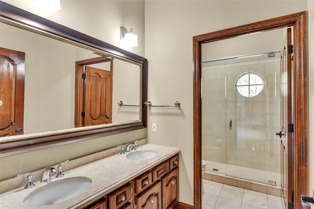 118 Lakeland Dr, Adams Twp, PA 16046 - full bath with a sink, a stall shower, toilet, and double vanity