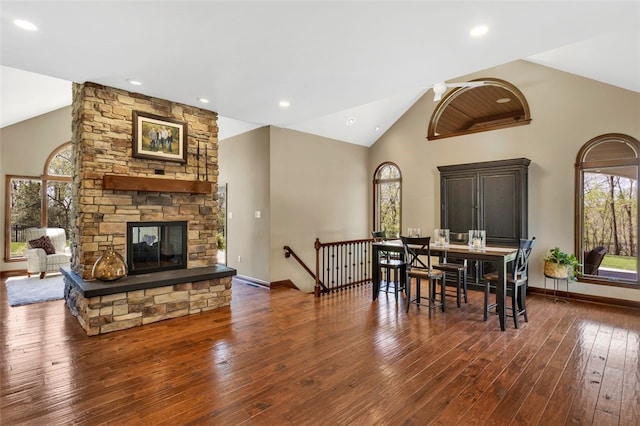 118 Lakeland Dr, Adams Twp, PA 16046 - dining room with wood-type flooring, a fireplace, baseboards, high vaulted ceiling, and a ceiling fan