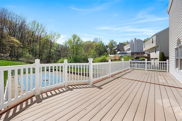 wooden terrace featuring a residential view