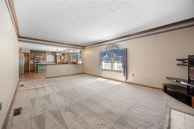 unfurnished living room featuring crown molding, visible vents, baseboards, light colored carpet, and a textured ceiling