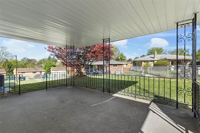view of patio featuring fence