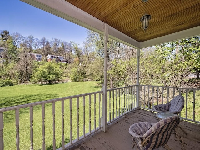 deck featuring a yard