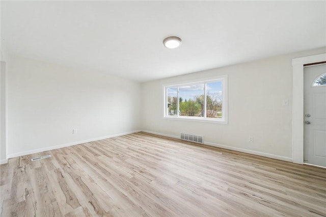 1460 Guffey Rd, North Huntingdon, PA 15642 - spare room featuring light wood-style floors, baseboards, and visible vents