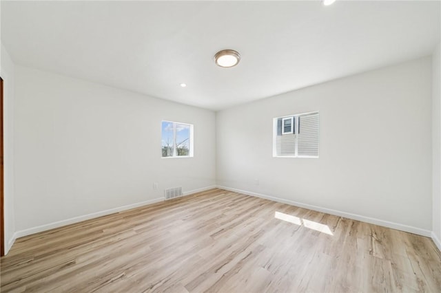 1460 Guffey Rd, North Huntingdon, PA 15642 - unfurnished room with recessed lighting, baseboards, light wood-type flooring, and visible vents