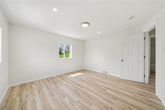 1460 Guffey Rd, North Huntingdon, PA 15642 - empty room with recessed lighting, baseboards, visible vents, and light wood-type flooring