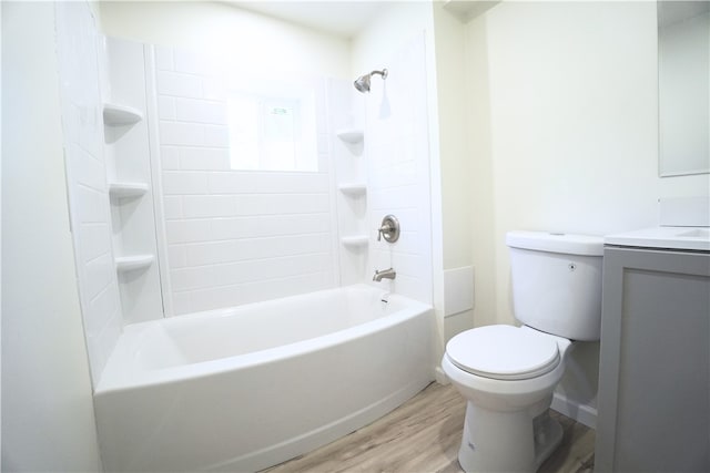 1460 Guffey Rd, North Huntingdon, PA 15642 - bathroom with vanity, shower / bath combination, wood finished floors, and toilet