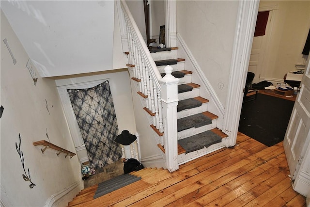 stairway with wood-type flooring