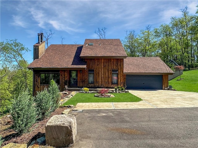 42 Elmhurst St, Green Tree, PA 15220 - view of front of home featuring a garage, a shingled roof, a front yard, and a chimney