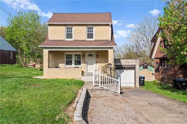 view of front facade with roof with shingles, driveway, a front lawn, and brick siding