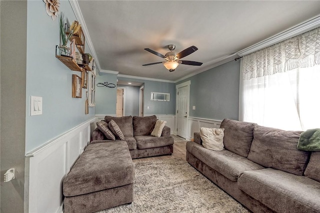 758 Beaver St, Rochester, PA 15074 - living area featuring wainscoting, ceiling fan, ornamental molding, and a decorative wall