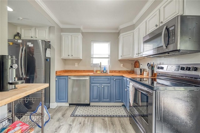 758 Beaver St, Rochester, PA 15074 - kitchen with wooden counters, blue cabinetry, appliances with stainless steel finishes, a sink, and light wood finished floors