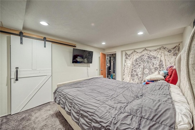 758 Beaver St, Rochester, PA 15074 - carpeted bedroom with a textured ceiling, recessed lighting, and a barn door