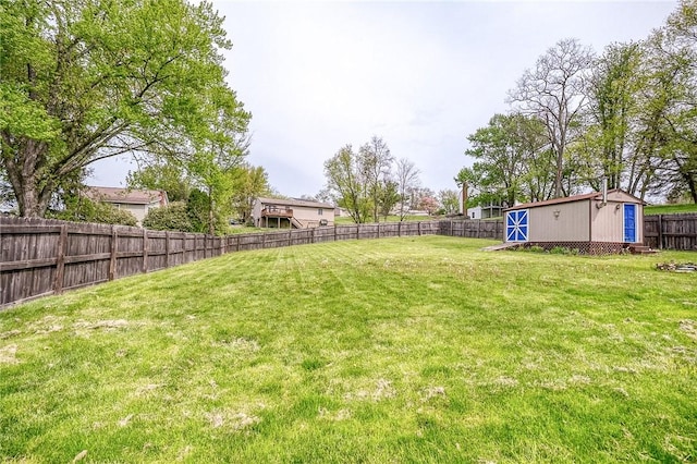 758 Beaver St, Rochester, PA 15074 - view of yard featuring an outdoor structure, a fenced backyard, and a storage unit