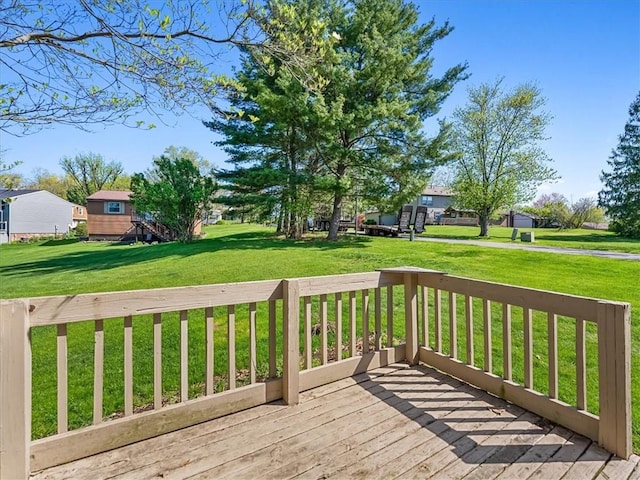deck featuring a lawn