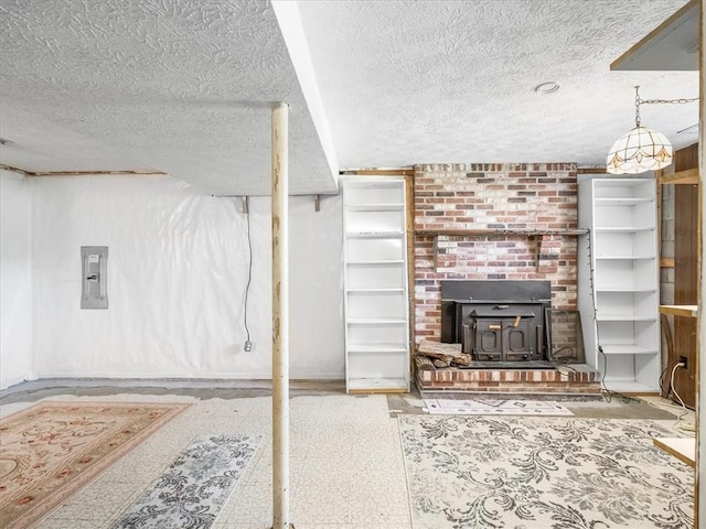 unfurnished living room with a textured ceiling
