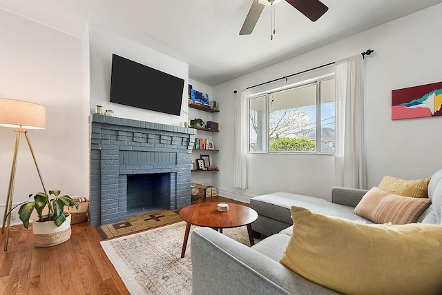 961 Deely St, Greenfield, PA 15217 - living room with ceiling fan, wood finished floors, and a fireplace