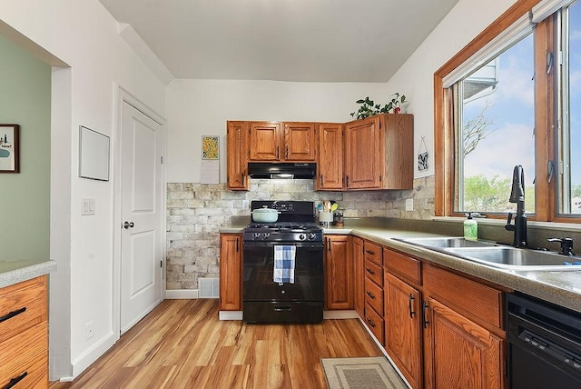 961 Deely St, Greenfield, PA 15217 - kitchen featuring brown cabinetry, a sink, ventilation hood, black appliances, and light wood finished floors