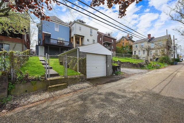 961 Deely St, Greenfield, PA 15217 - exterior space with an outbuilding, a residential view, fence private yard, and a garage