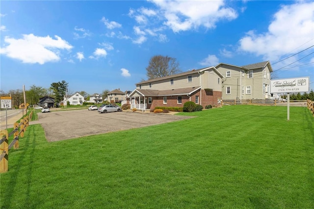 view of yard with a residential view
