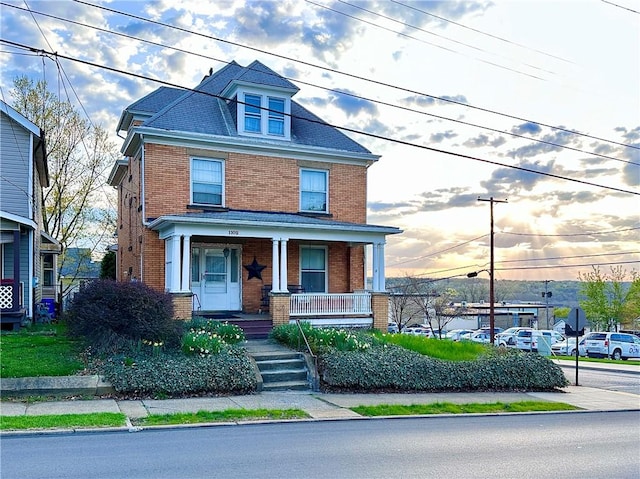 1102 E Washington St, New Castle/4Th, PA 16101 - traditional style home with brick siding and covered porch