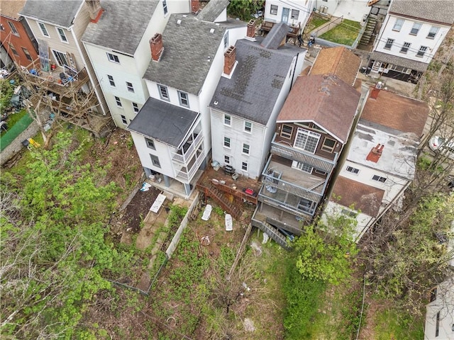 birds eye view of property with a residential view